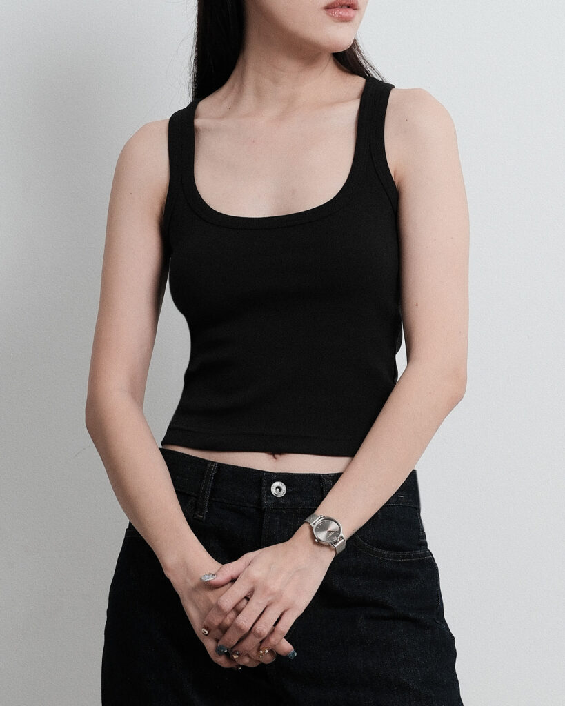 Woman wearing the black Scoopneck Tank