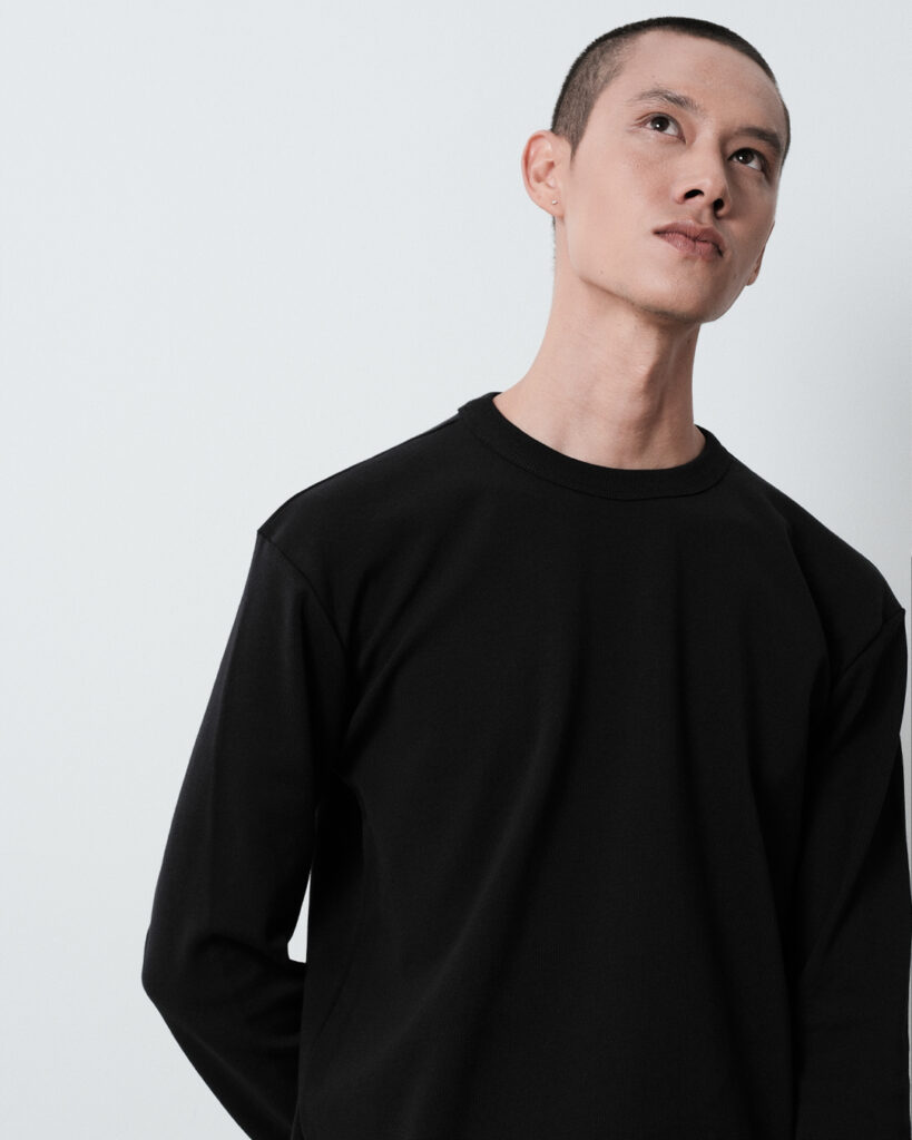 Man wearing a black Finewale long sleeve