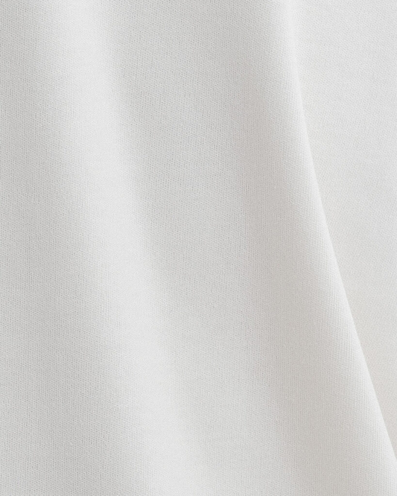 Close-up of Finewale Interlock 250 in Cloud Dancer