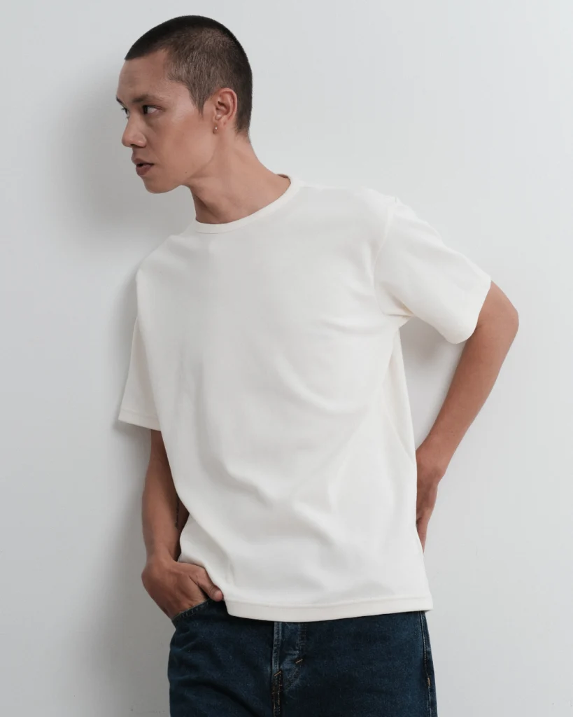 Man in a Cloud Dancer Finewale T-shirt and jeans